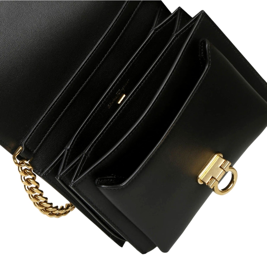 Image 981209_ALTMORE3.jpg, Product 981-209 / Price $3,172.00, Ferragamo Trifolio Black Leather Flap Crossbody Bag Gold Gancini Designer from Salvatore Ferragamo on TSC.ca's Fashion department
