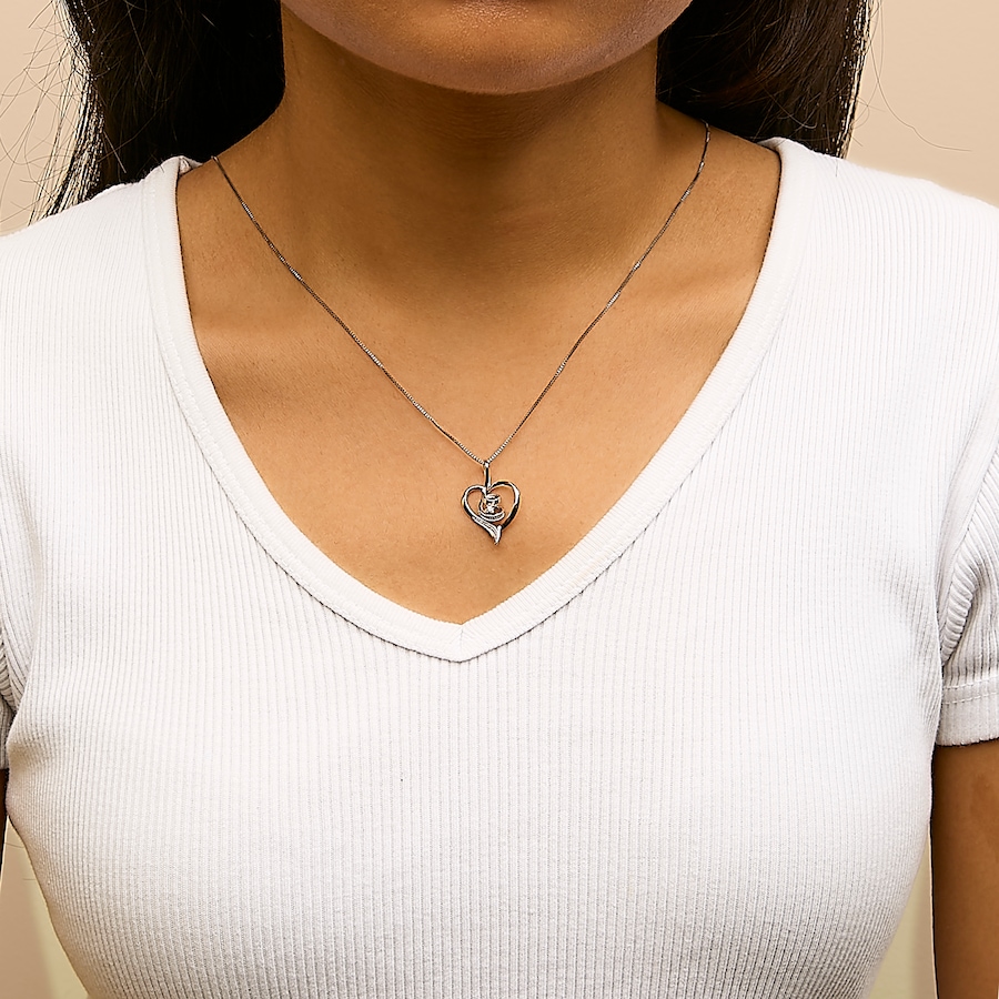 Image 990411_ALTMORE2.jpg, Product 990-411 / Price $1,247.00, Espira 10K White Gold .03 Cttw Diamond-Accented Round-Cut Diamond Swirl Open Heart 18" Pendant Necklace (I-J Color, I2-I3 Clarity) from Haus of Brilliance on TSC.ca's Jewellery department