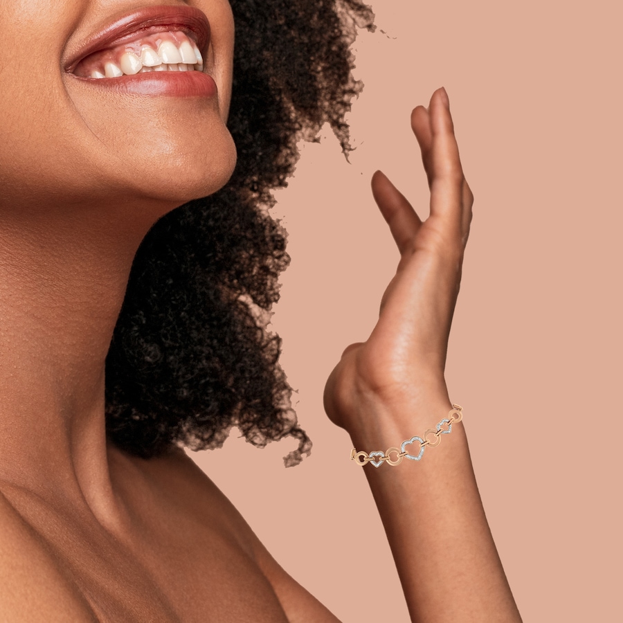 Image 990516_ALTMORE5.jpg, Product 990-516 / Price $878.00, 10K Rose Gold over .925 Sterling Silver 1/10 Cttw Round-Cut Diamond Heart Link Adjustable Bolo Bracelet (H-I Color, I2-I3 Clarity) - 6"-9" Adjustable from Haus of Brilliance on TSC.ca's Jewellery department