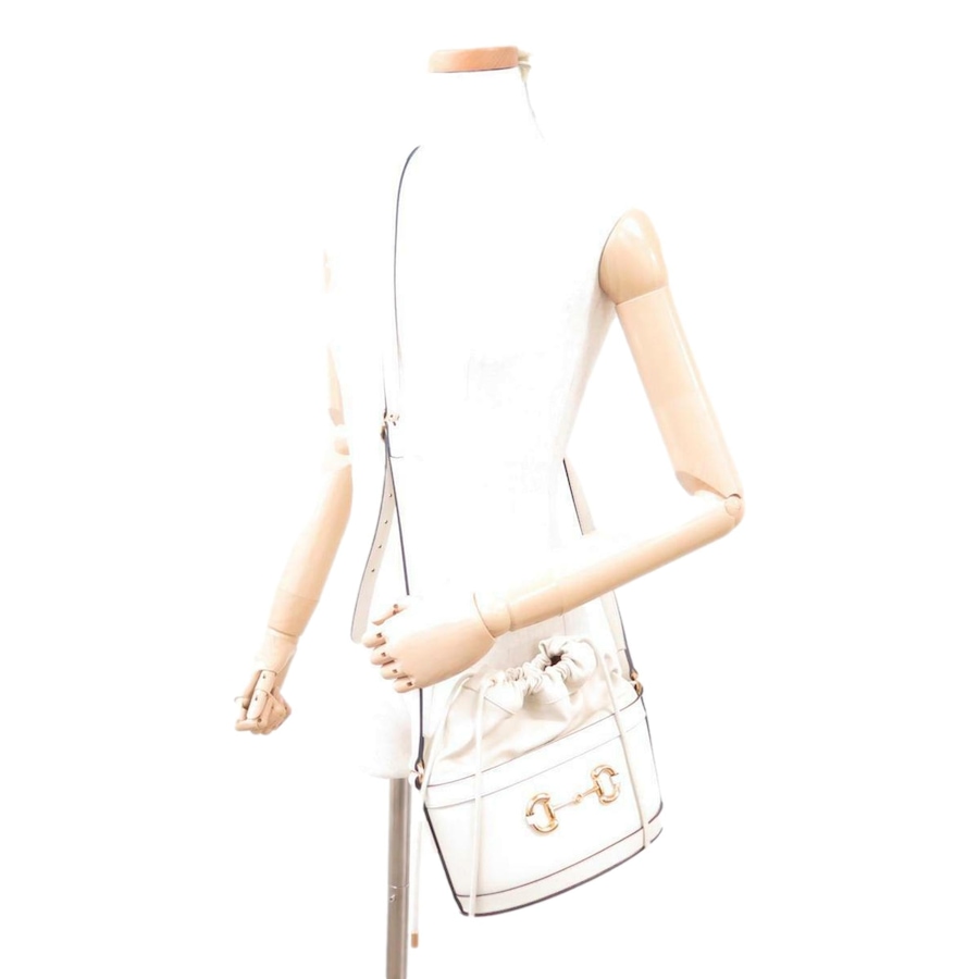 Image 993480_ALTMORE5.jpg, Product 993-480 / Price $3,657.00, Gucci 1955 Horsebit White Leather Bucket Bag Drawstring Crossbody from Gucci on TSC.ca's Fashion department