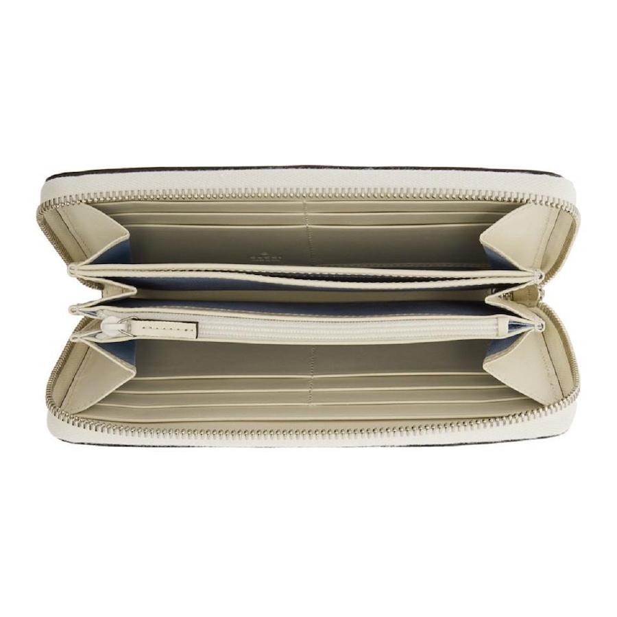 Image 993517_ALTMORE4.jpg, Product 993-517 / Price $1,264.00, Gucci Sega Guccy Stars White Moon Gold Zipper Leather Wallet from Gucci on TSC.ca's Fashion department
