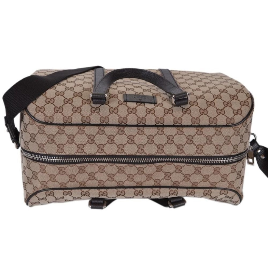 Image 993538_ALTMORE11.jpg, Product 993-538 / Price $3,737.00, Gucci Large GG Logo Beige Canvas Brown Leather Strap Duffle Bag from Gucci on TSC.ca's Fashion department