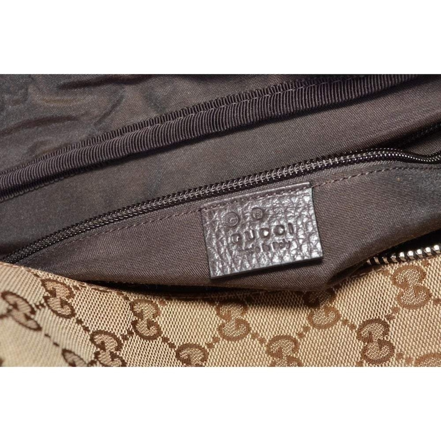 Image 993538_ALTMORE12.jpg, Product 993-538 / Price $3,737.00, Gucci Large GG Logo Beige Canvas Brown Leather Strap Duffle Bag from Gucci on TSC.ca's Fashion department