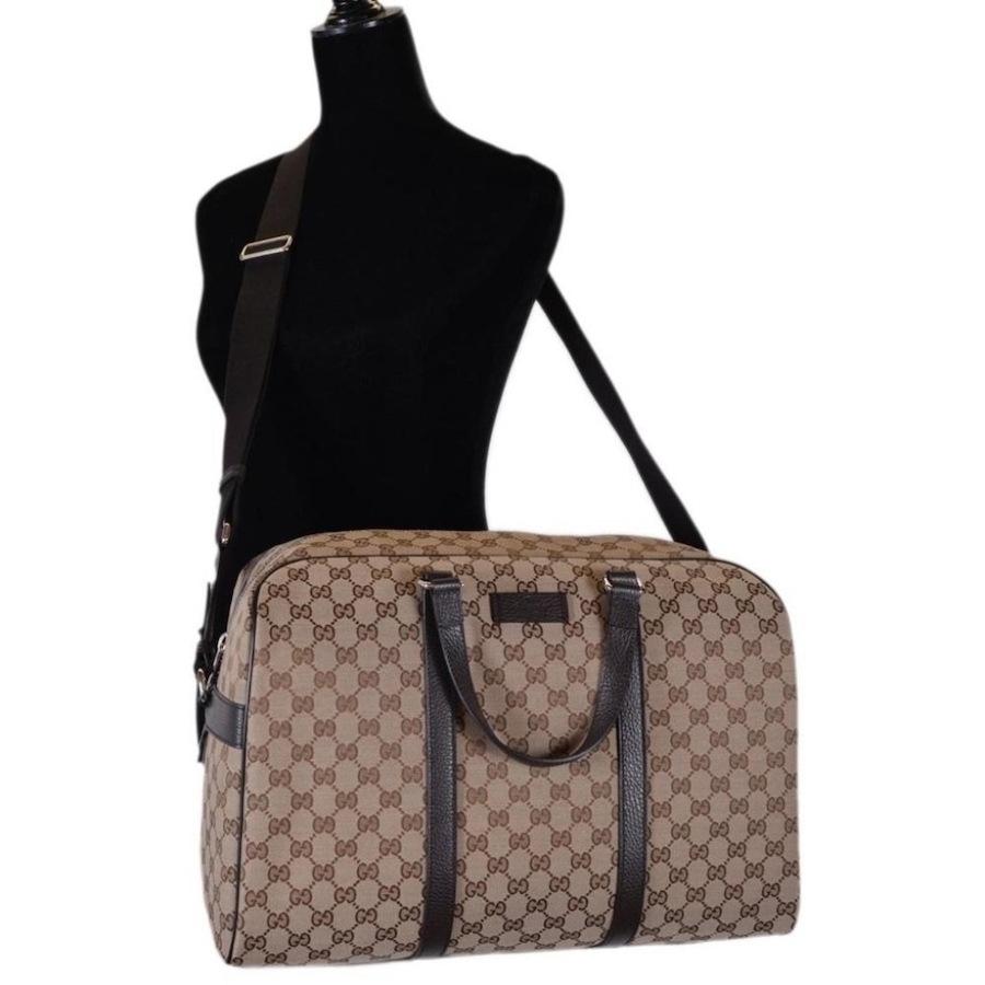 Image 993538_ALTMORE7.jpg, Product 993-538 / Price $3,737.00, Gucci Large GG Logo Beige Canvas Brown Leather Strap Duffle Bag from Gucci on TSC.ca's Fashion department