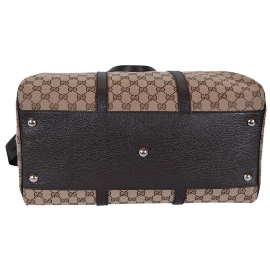 Image 993538_ALTMORE9.jpg, Product 993-538 / Price $3,737.00, Gucci Large GG Logo Beige Canvas Brown Leather Strap Duffle Bag from Gucci on TSC.ca's Fashion department