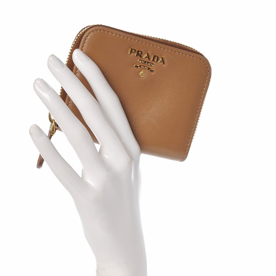 Image 993640_ALTMORE9.jpg, Product 993-640 / Price $1,256.00, Prada Vitello Move Cipria Beige Leather Zip Around Wallet from Prada on TSC.ca's Fashion department