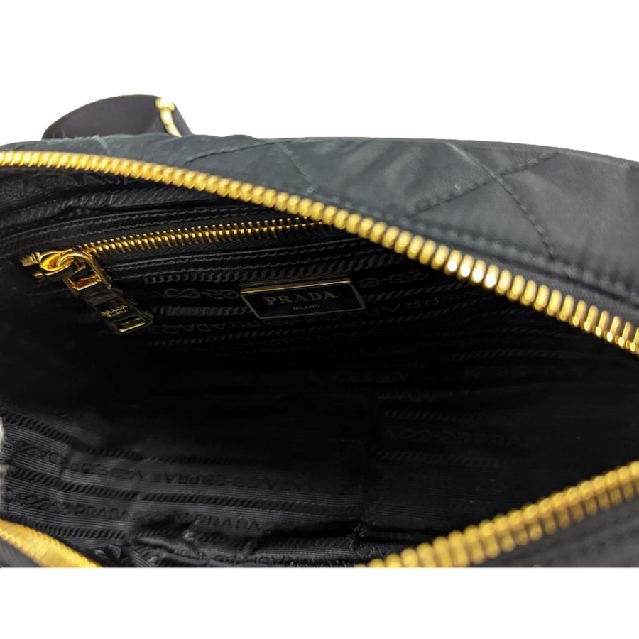 Image 994221_ALTMORE5.jpg, Product 994-221 / Price $3,737.00, Prada Tessuto Black Quilted Nylon Triangle Logo Camera Crossbody Bag from Prada on TSC.ca's Fashion department