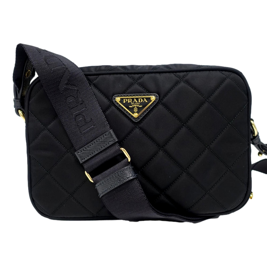 Image 994221_ST01.jpg, Product 994-221 / Price $3,737.00, Prada Tessuto Black Quilted Nylon Triangle Logo Camera Crossbody Bag from Prada on TSC.ca's Fashion department